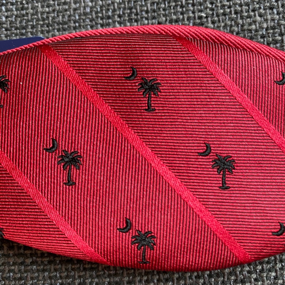New with tags - reversible red bow-tie with black palm trees